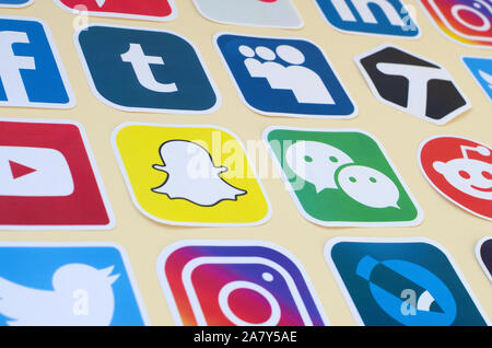 KHARKOV, UKRAINE - OCTOBER 17, 2019: Many paper icons with logo of most popular social networks and smartphone apps for chat and conversations online Stock Photo