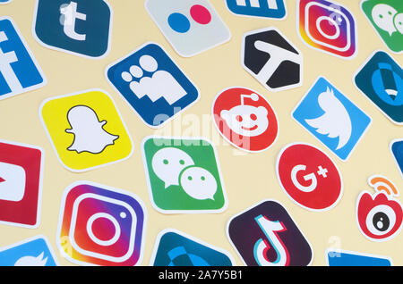 KHARKOV, UKRAINE - OCTOBER 17, 2019: Many paper icons with logo of most popular social networks and smartphone apps for chat and conversations online Stock Photo