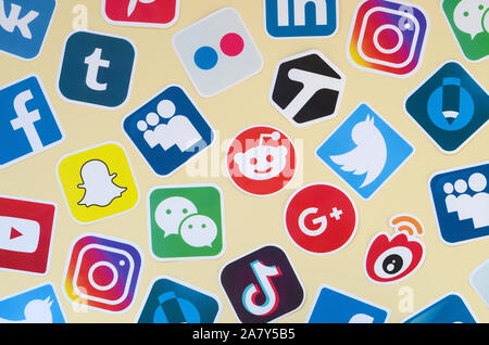 KHARKOV, UKRAINE - OCTOBER 17, 2019: Many paper icons with logo of most popular social networks and smartphone apps for chat and conversations online Stock Photo