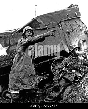This photo from a captured German film shows a Nazi soldier beside a ...