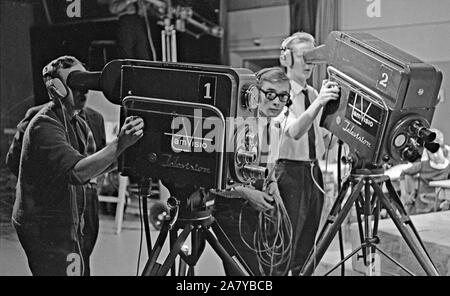 Tamvision's camera operator Kauno Peltola, studio director Raimo Mikkola  and camera operator Tuomo Kurikka film a television program at Frenckell's  studio in Tampere Stock Photo - Alamy