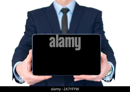 A businessman wholding tablet in his hands, isolated on white background, focus on tablet Stock Photo