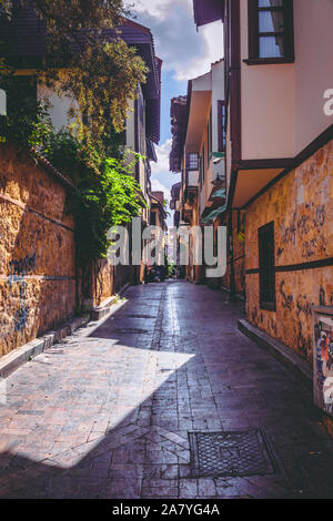 Antalya, Turkey - 06th October 2019: Typical narrow street in most visited old town.Old townn in city centrum is a must see place for tourists. Stock Photo