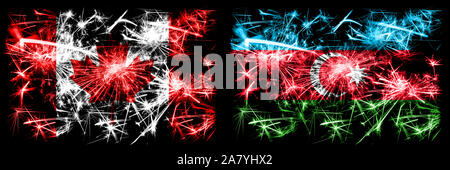 Canada, Canadian vs Azerbaijan, Azerbaijani New Year celebration sparkling fireworks flags concept background. Combination of two abstract states flag Stock Photo