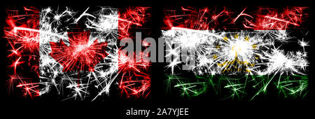 Canada, Canadian vs Tajikistan, Tajikistani New Year celebration sparkling fireworks flags concept background. Combination of two abstract states flag Stock Photo