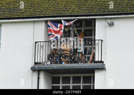 Jardine Crescent flats displaying a British flag on the balcony on Tile Hill in Coventry on November 4th 2019. Stock Photo