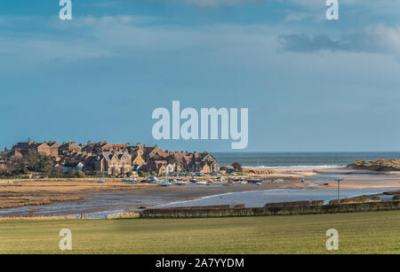 Panoramic view of the Northumberland Coast AONB village and harbour at Alnmouth in winter sunshine Stock Photo