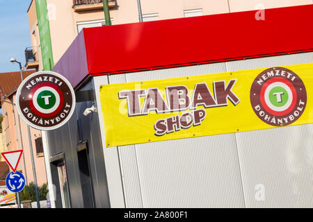 Tabak shop national tobacco shop (nemzeti dohanybolt) sign on modern metal building front, Sopron, Hungary Stock Photo