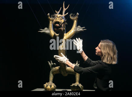 Bonhams London, UK. 5 November 2019. A Very Large Imperial Gilt-Bronze Repousse Model of a Five Clawed Dragon, 18th/19th century. Estimate :£8,000-12,000 at Bonhams New Bond Street as part of Asia Art week. amer ghazzal /Alamy live News Stock Photo