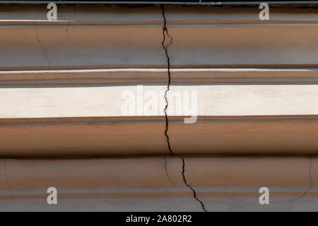 A large crack in a wall Photographed at Sankt Urlichs church, Vienna Stock Photo