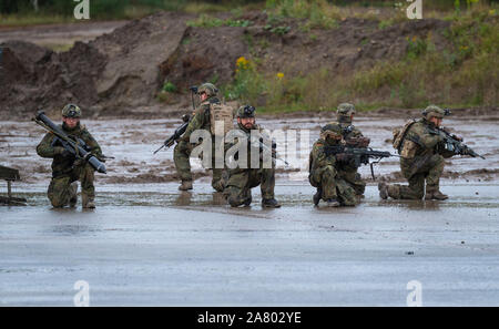 Munster, Germany. 11th Oct, 2019. Soldiers of the German Federal Armed Forces fight in the information training exercise Land Operations 2019, on the training range. Credit: Philipp Schulze/dpa/Alamy Live News Stock Photo