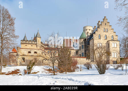 Exterior view from the south to beautiful winterly Lichtenstein Castle, Swabian Alb, Baden-Wurttemberg, Germany. Stock Photo