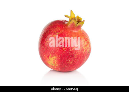One whole fresh red pomegranate isolated on white background Stock Photo