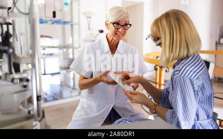 Ophthalmology eyesight diagnostic concept. Modern eye test machine equipment in clinic Stock Photo