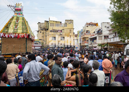 Crowd of devotees celebrating Kutti Kudithal Festival in Trichy, Tamil Nadu, India Stock Photo