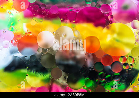 Multi-colored circles. Drops of oil in water. Abstract background Stock Photo