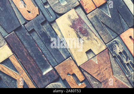 Detail of wood letterpress printing blocks with retro style processing Stock Photo