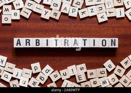 Arbitration word concept on cubes for articles Stock Photo