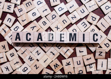Academic word concept on cubes for articles Stock Photo