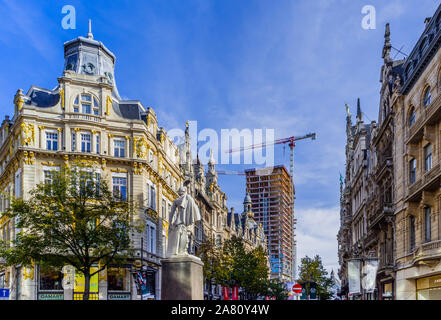 View down Leystraat shopping street towards Antwerp Tower reconstruction - Antwerp, Belgium. Stock Photo