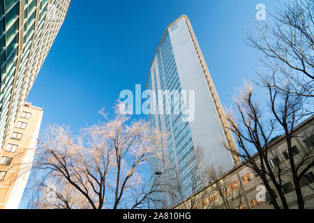 Milan, Italy: skyscraper Pirelli Tower, commonly known as Pirellone, against blue sky background. Stock Photo