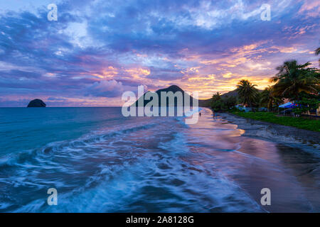 Le Diamant, Martinique, France - 17 August 2019: Le Diamant Beach in Martinique at sunset Stock Photo