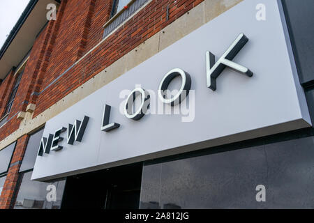 a new look sign on the exterior of a new look shop Stock Photo