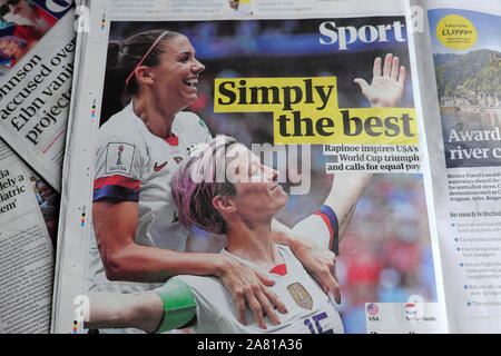 USA women's World Cup in Lyon France football soccer winners Morgan and Rapinoe celebrate their victory Guardian newspaper Sport section London UK Stock Photo