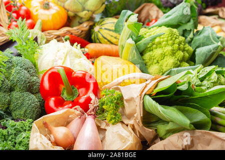 Zero waste shopping. Assortment of colorful organic vegetables, cabbage tomatoes onions mushrooms squash peppers garlic. Healthy background close up, selective focus Stock Photo