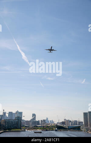 Planes flying over the city of London, England Stock Photo