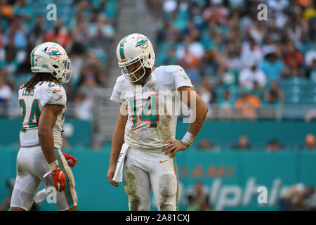 MIAMI GARDENS, FL - NOVEMBER 18: Virginia Cavaliers Wide Receiver Andre  Levrone (14) catches a ball on the field before the start of the college  football game between the Virginia Cavaliers and