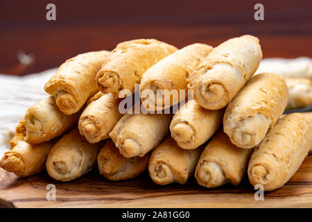 Small italian bread rolls crostini made from wheat dough with sesame close up Stock Photo