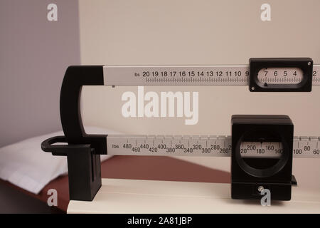 Doctor's Office Scale - Medical professional physician sliding balance  weight scale at a doctor's office Stock Photo - Alamy