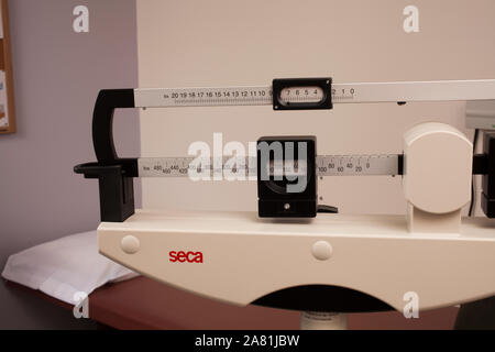 Doctor's Office Scale - Medical professional physician sliding balance  weight scale at a doctor's office Stock Photo - Alamy