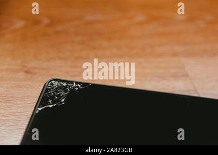 tablet computer screen with broken glass after a fall. Stock Photo