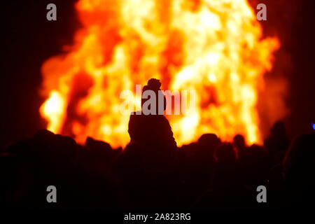 A child spectator at a bonfire at Springhead Park in Rothwell, Leeds. Stock Photo