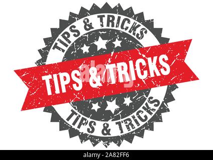 tips & tricks grunge stamp with red band. tips & tricks Stock Vector