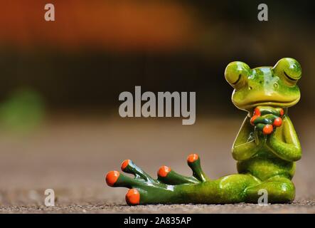 FUNNY CERAMIC FROGS Stock Photo