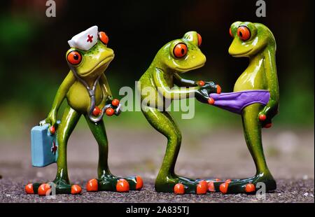 FUNNY CERAMIC FROGS Stock Photo