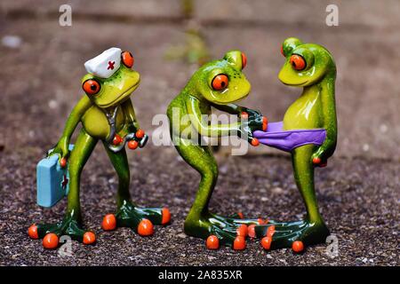 FUNNY CERAMIC FROGS Stock Photo