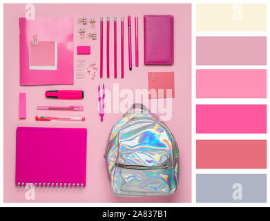 School backpack and stationery on color background. Different color patterns Stock Photo
