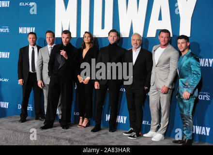 Los Angeles, California, USA 5th November 2019 (L-R) Actors Aaron Eckhart, Patrick Wilson, Ed Skrein, Mandy Moore, Luke Kleintank, director/producer Roland Emmerich, actors Luke Evans and Nick Jonas attend World Premiere of Lionsgate's 'Midway' on November 5, 2019 at Regency Village Theatre in Los Angeles, California, USA. Photo by Barry King/Alamy Live News Stock Photo