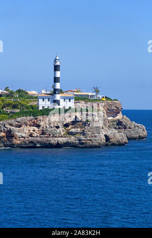 Lighthouse on a rock at Porto Colom, Mallorca, Balearic islands, Spain Stock Photo