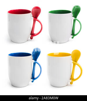 Set of colored cups with spoon isolated Stock Photo
