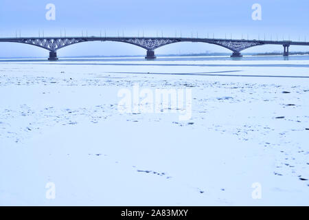 The bridge in the evening between the cities of Saratov and Engels, Russia. Stock Photo