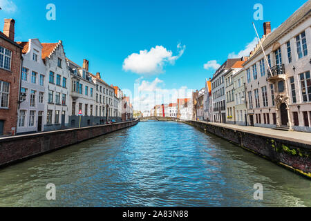 Monument of famous artist Jan Van Eyck on Square Jan van Eyckplein in Bruges, Belgium. Stock Photo