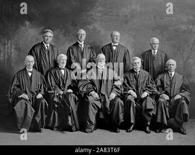 United States Supreme Court ca. 1920s  Left to Right Front Row - William Day, Joseph McKenna, William Howard Taft, Oliver Wendell Holmes, Van DeVanter??  Back row unidentified Stock Photo