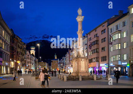 Maria-Theresien-Strasse Maria Theresa Street with the Annasaule St. Anna's Column, one of the busiest streets in the city of Innsbruck, Tyrol, Austria Stock Photo