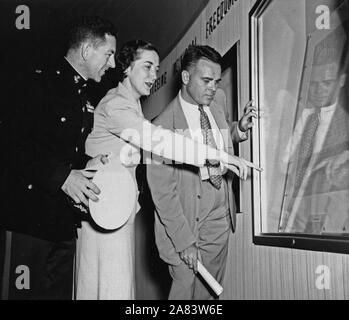 Photograph of Lt. Col. Scott, USMC, Elizabeth Bukowsky, and John F. (Mike) Simmons at the Official Preview of the Freedom Train Exhibit Stock Photo