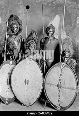 Four masai warriors in full war dress, Kenya 1890-1923 Stock Photo